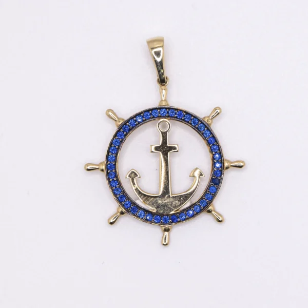 Dije con imagen de timón y ancla con piedras color navy, 14k