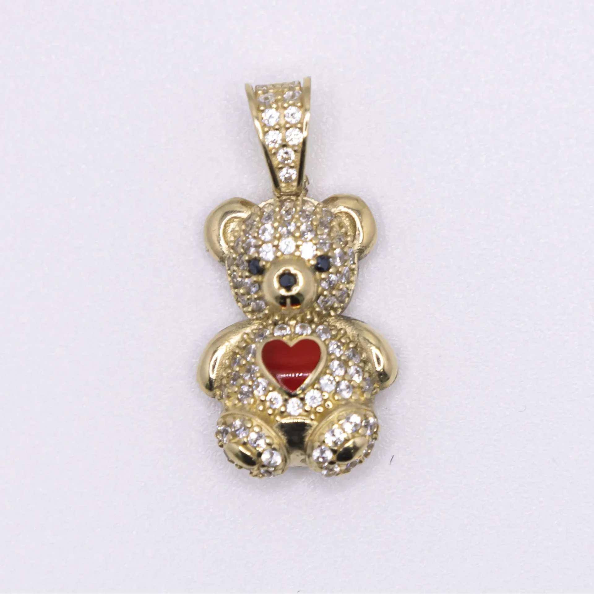 Dije de Osito en 10k y zirconia con corazon color rojo