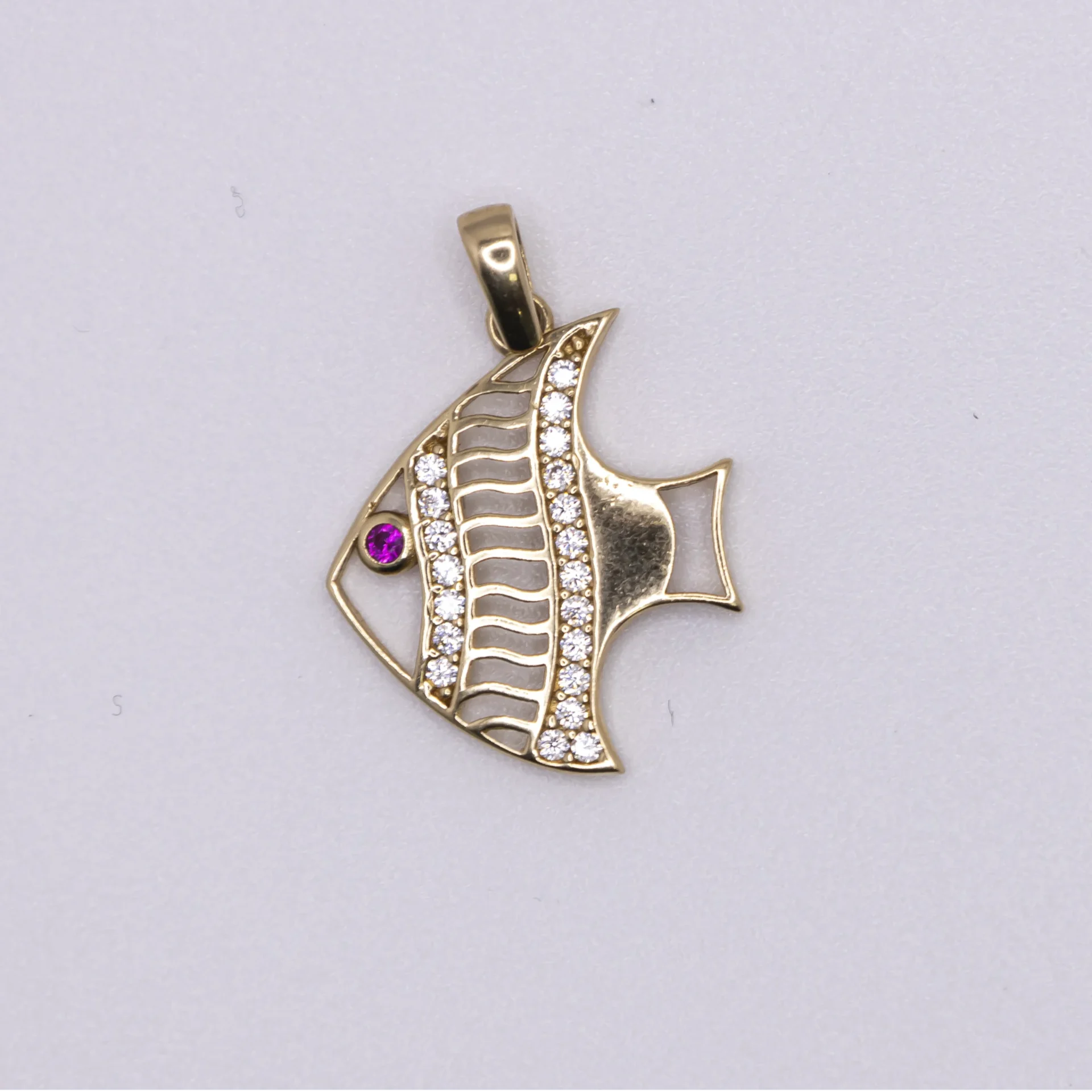Dije en forma pez con zirconia y ojo color Rubi 14k