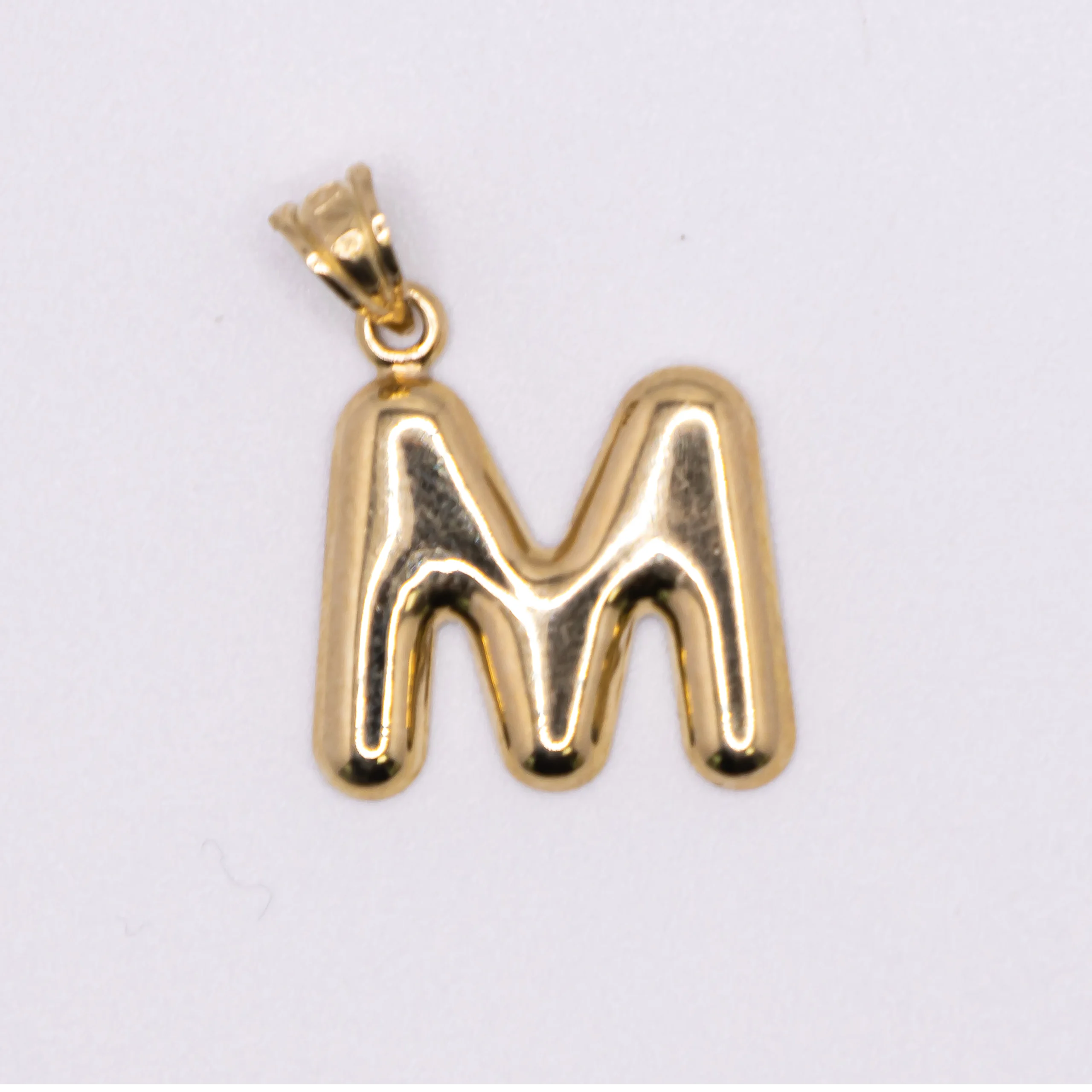 Dije inicial M 10k