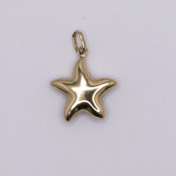 Dije pequeño modelo colgante en oro blanco y amarillo 14k