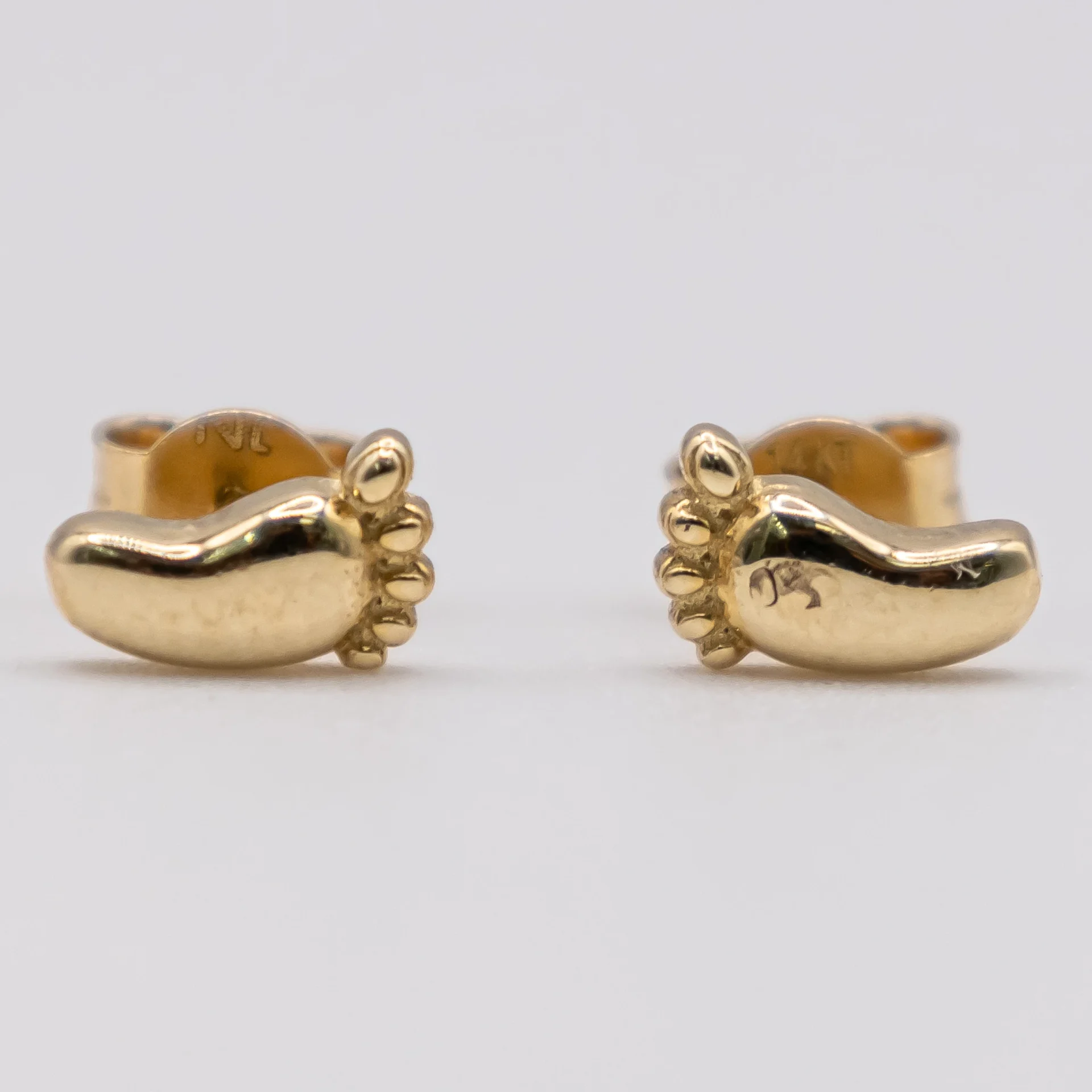 Aretes con Diseño de Pies 14k