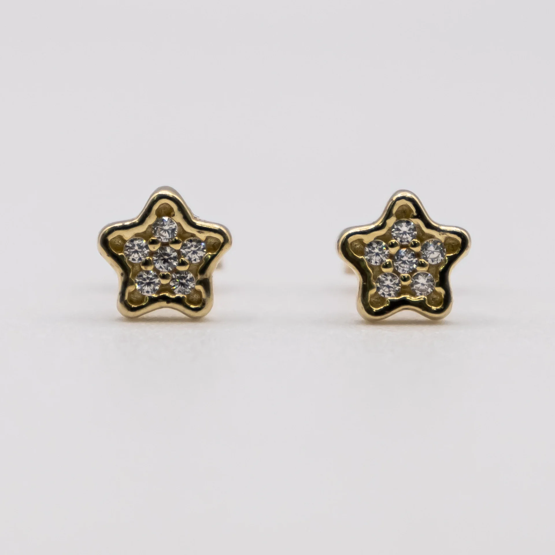 Aretes Estrellas y Zirconia 10k