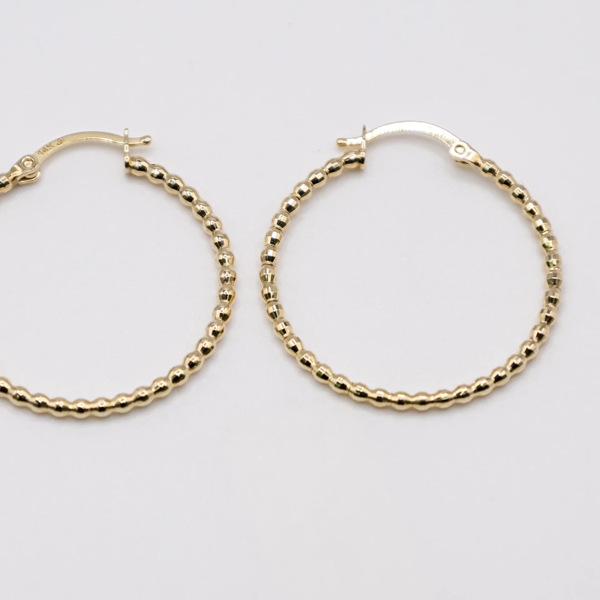 Argollas Grandes con Aros de Cuentas 14k