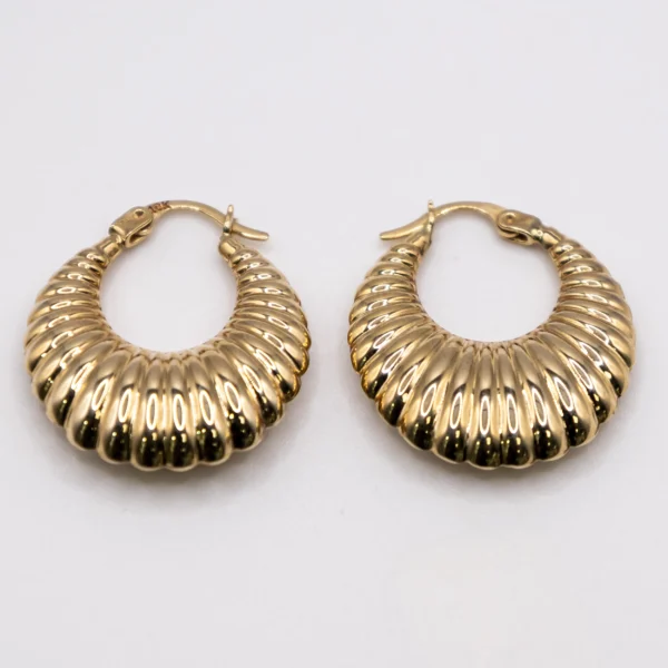 Argollas con Estilo Twisted Hoop 10k
