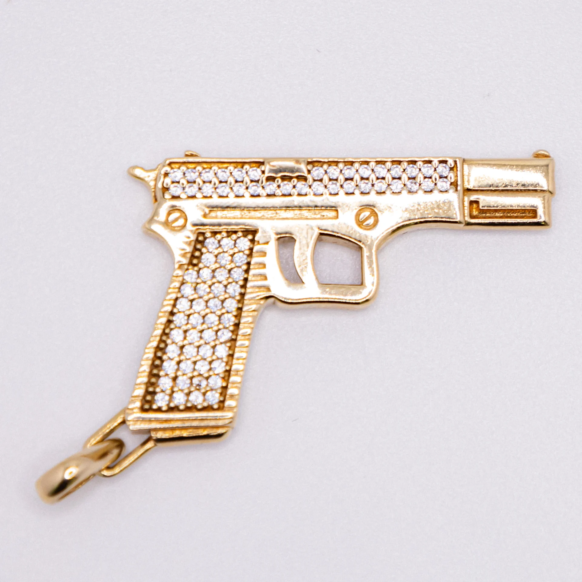 Dije de Pistola