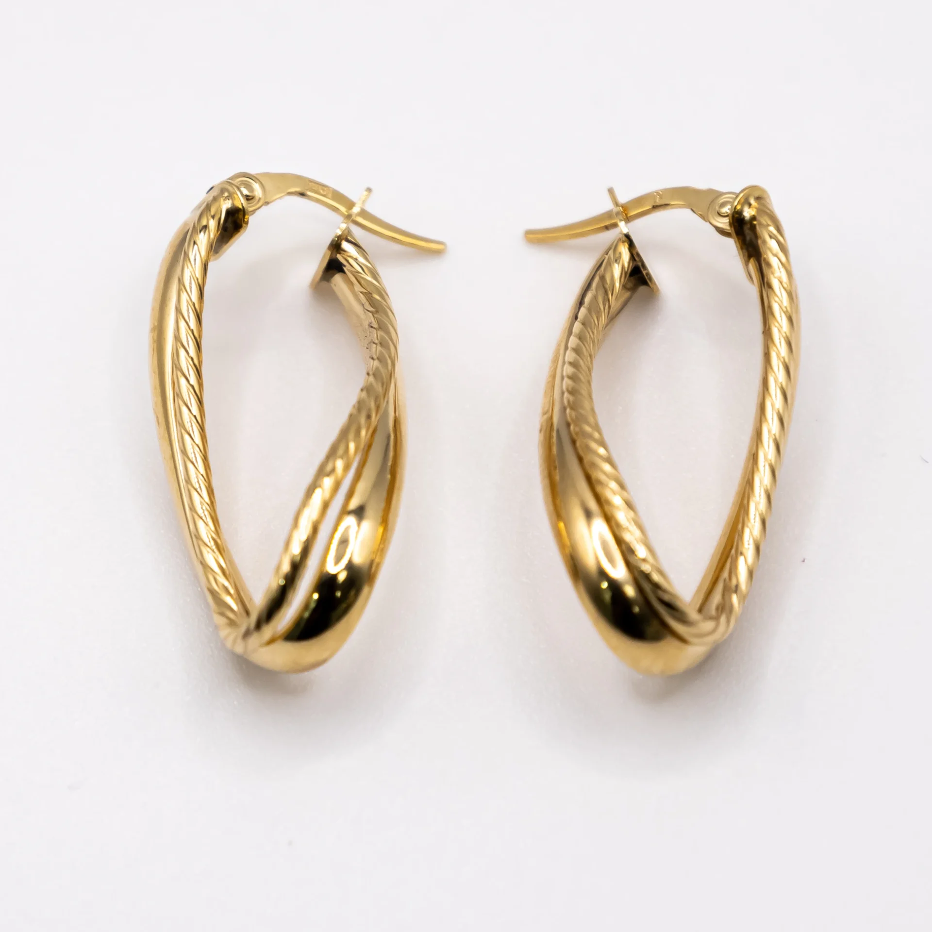 Argollas de Aro Ovalado y Trenzado 14k