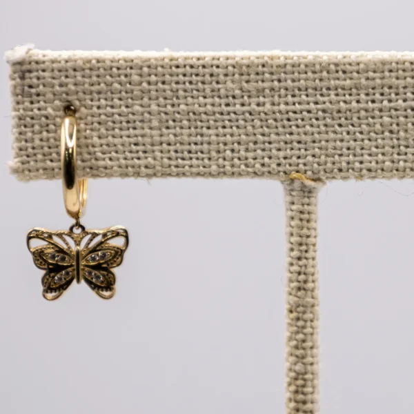 Aretes colgantes de mariposa y zirconia