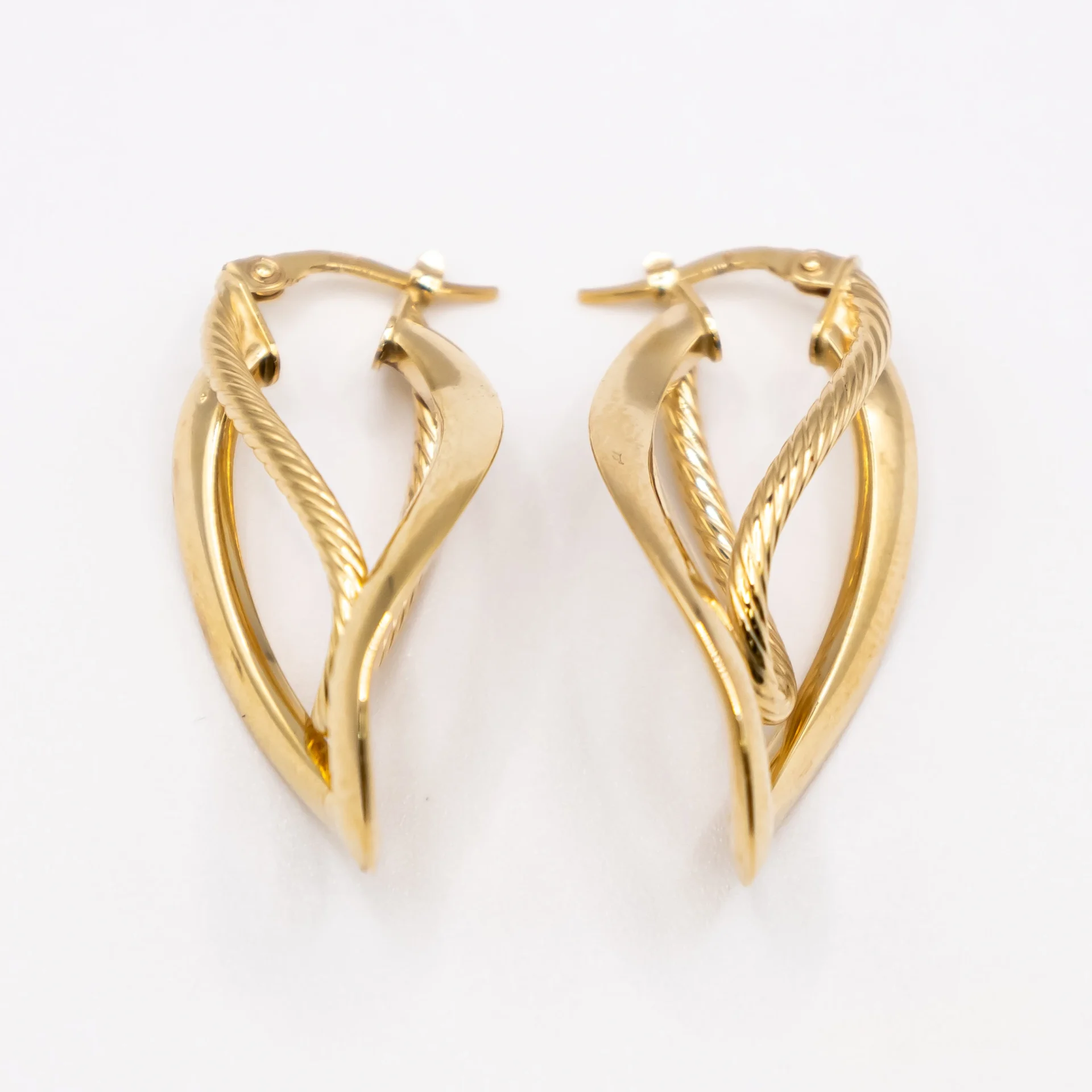 Argollas con Aros Alargados y Oblicuos 14k