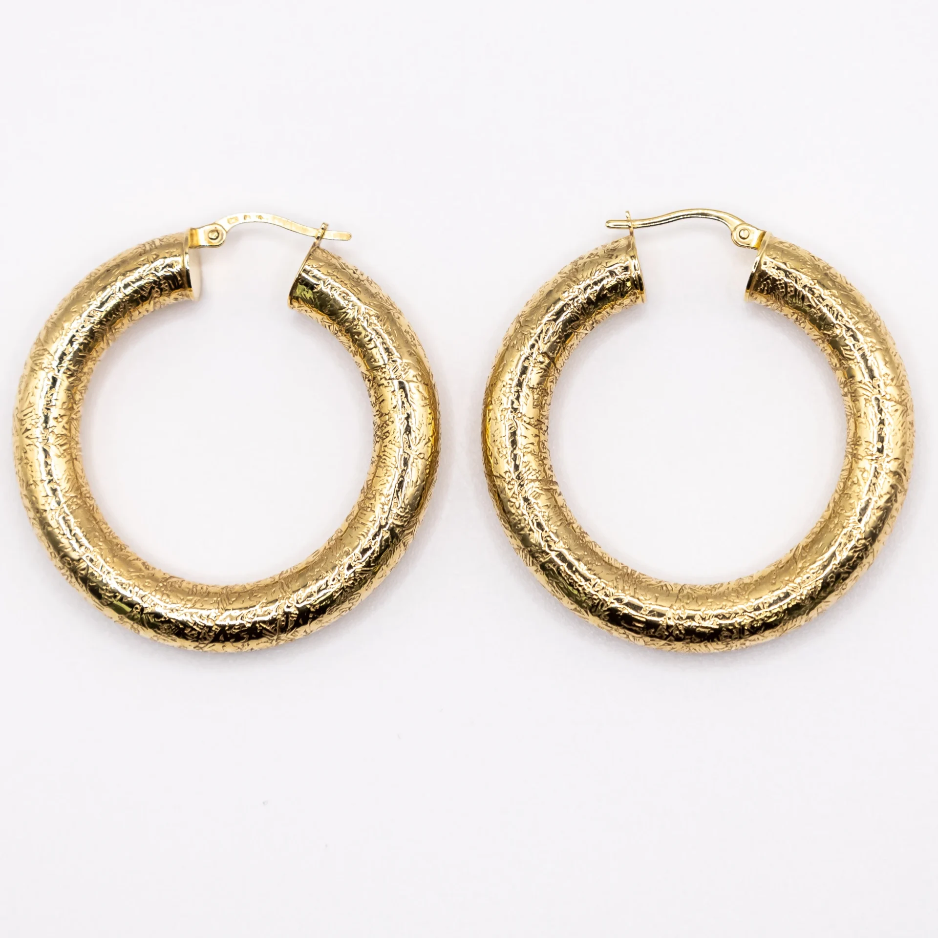 Argollas Medianas De Aros De Tubo Escamado 10k