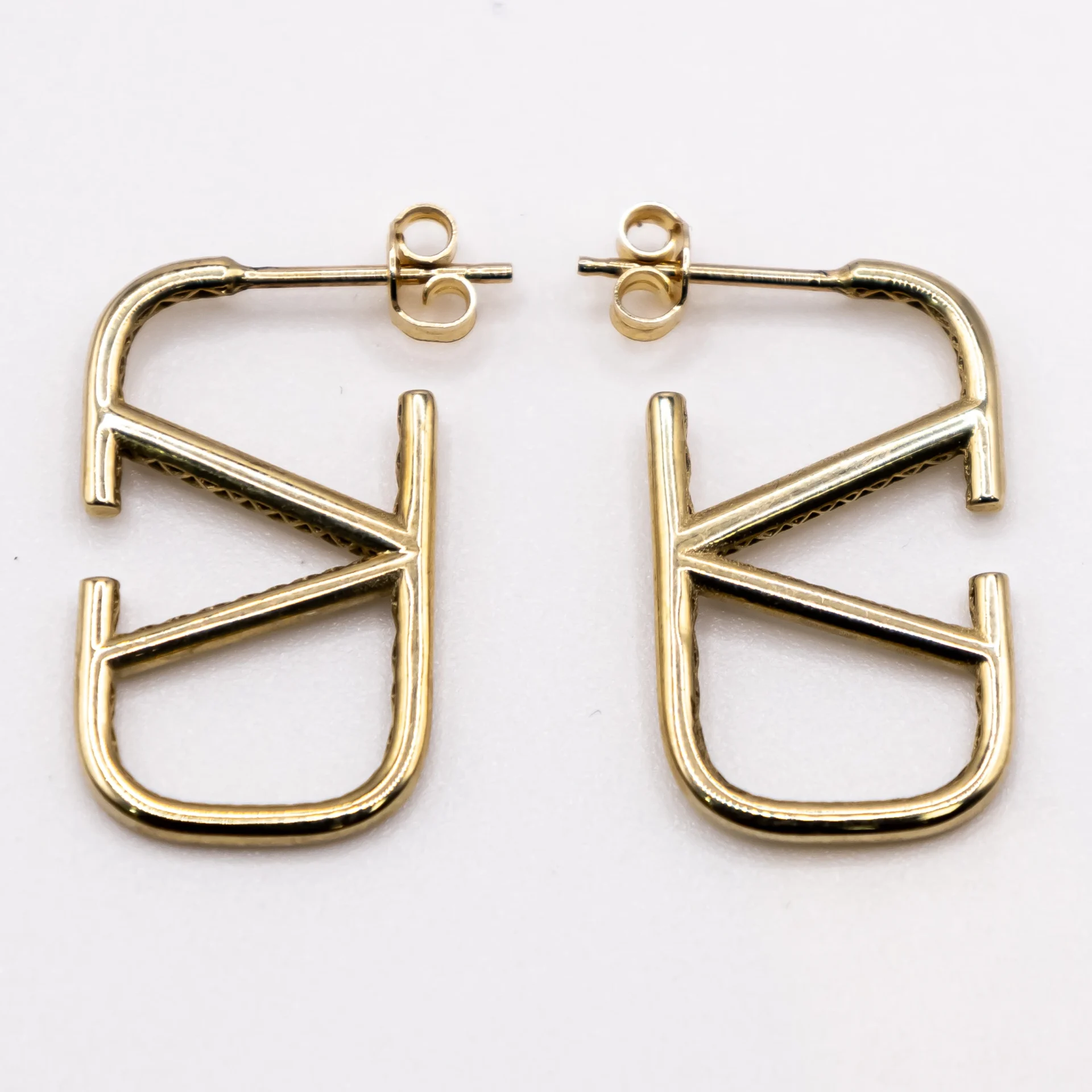 Aretes colgantes estilo Louis Vuitton