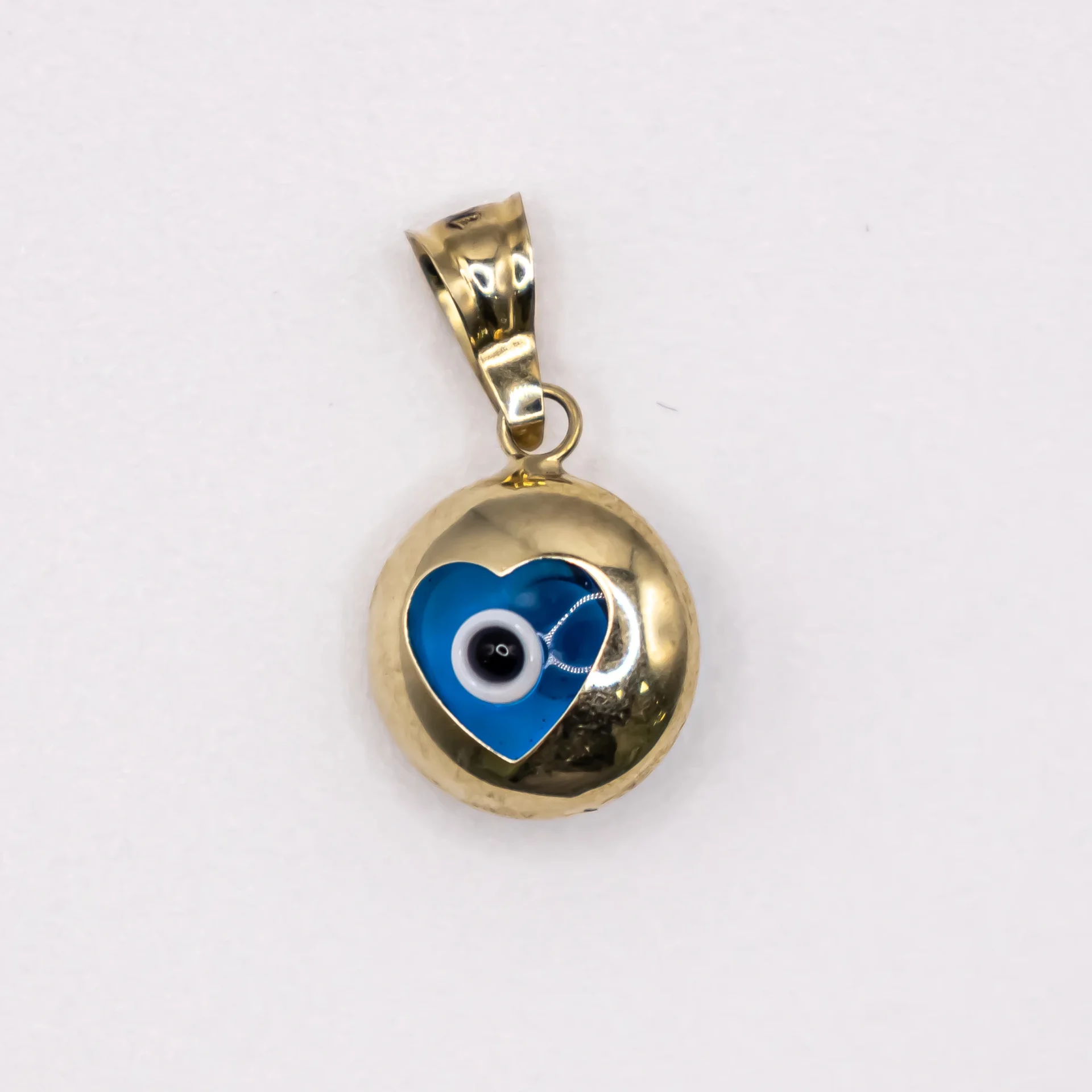 Dije de Corazon con Ojo Turco