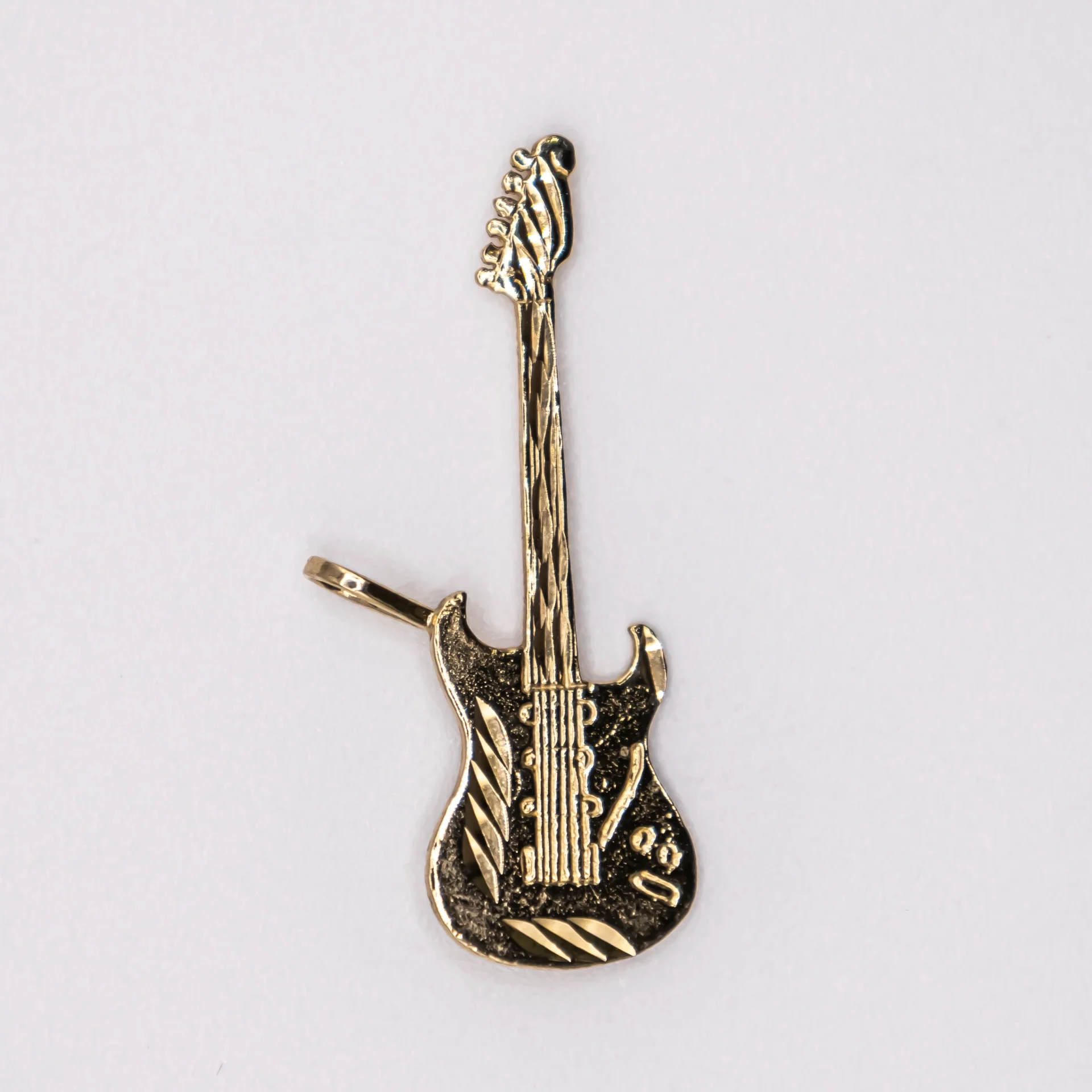 Dije de Guitarra