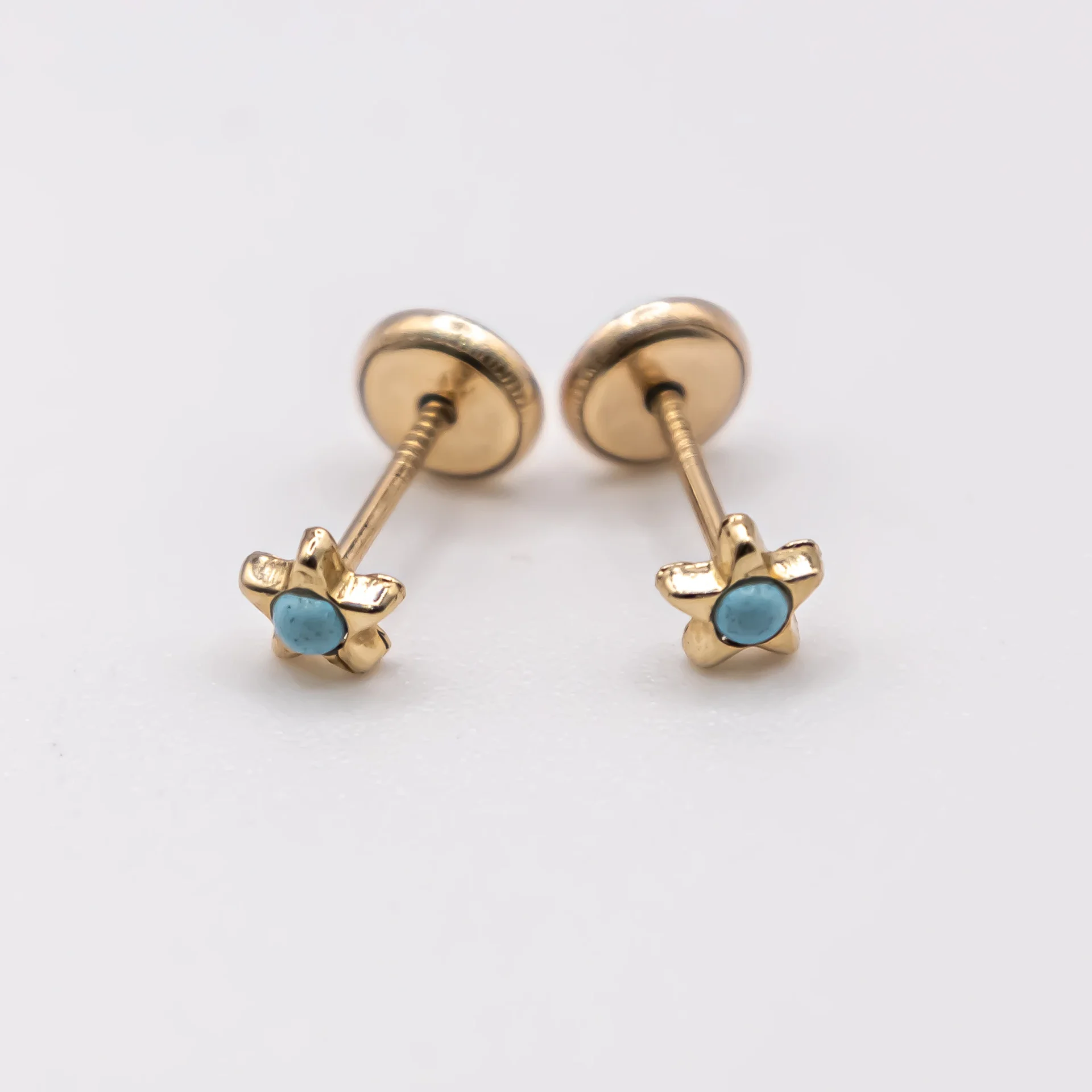 Aretes de estrella con piedra turqueza